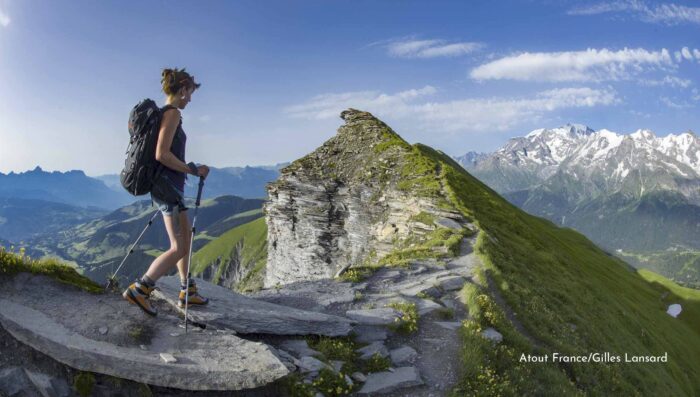 hiker in the french alps summer trip